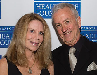 Photo of Dr. Charles and Lisa Loewe. Link to their story.